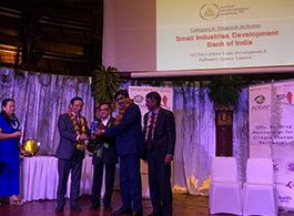 Jiji Mammen receiving ADFIAP Award on behalf of SIDBI